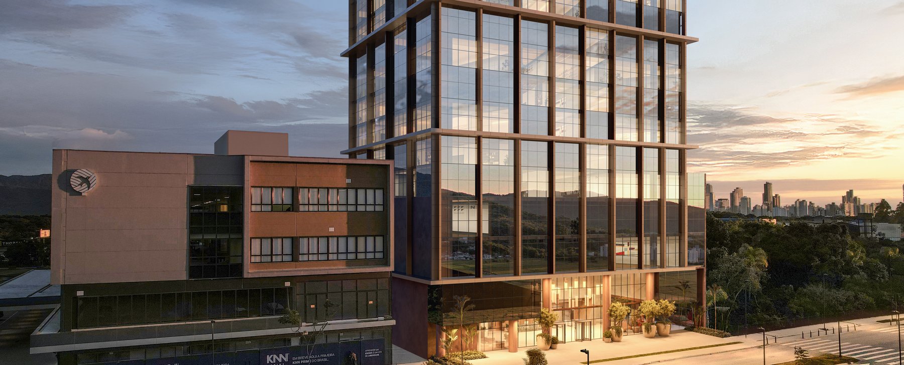 Facade — ground level and entrance at dusk · Veccel · Vivapark Porto Belo