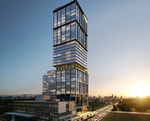 Fachada — Veccel Corporate ao pôr do sol · Vivapark Porto Belo